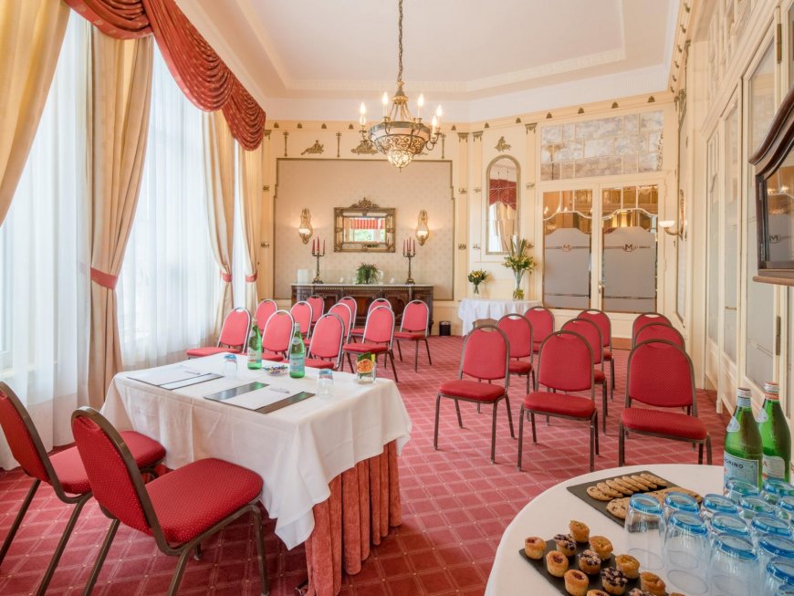 Empire lounge with period decoration at Hotel Mirabeau, intimacy and tradition