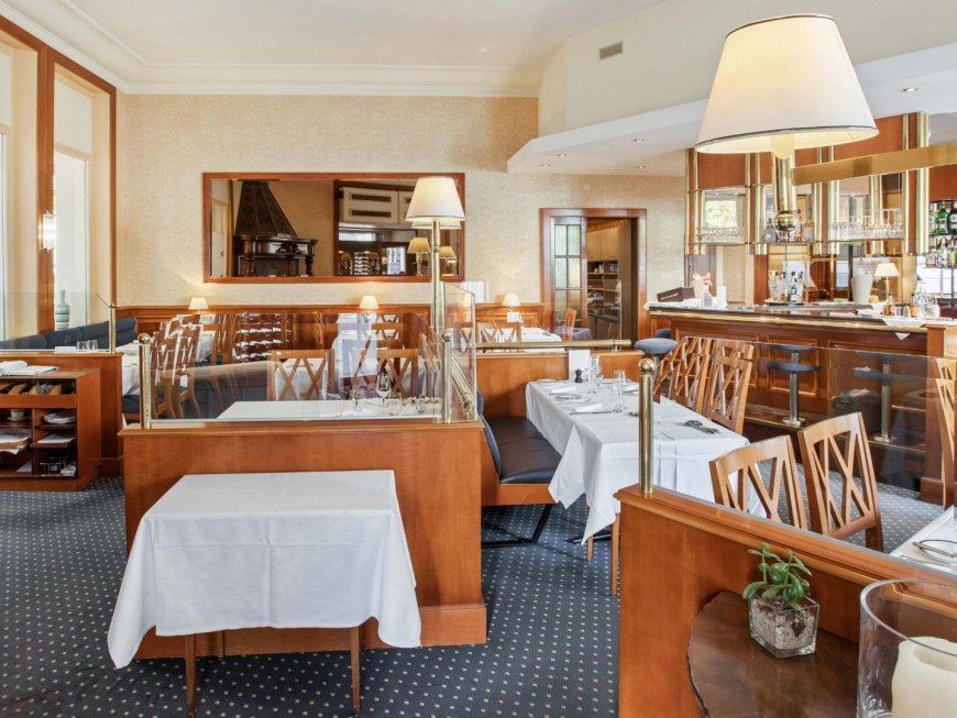 Spacious and comfortable dining room at Mirabeau Restaurant, authenticity meets gastronomy